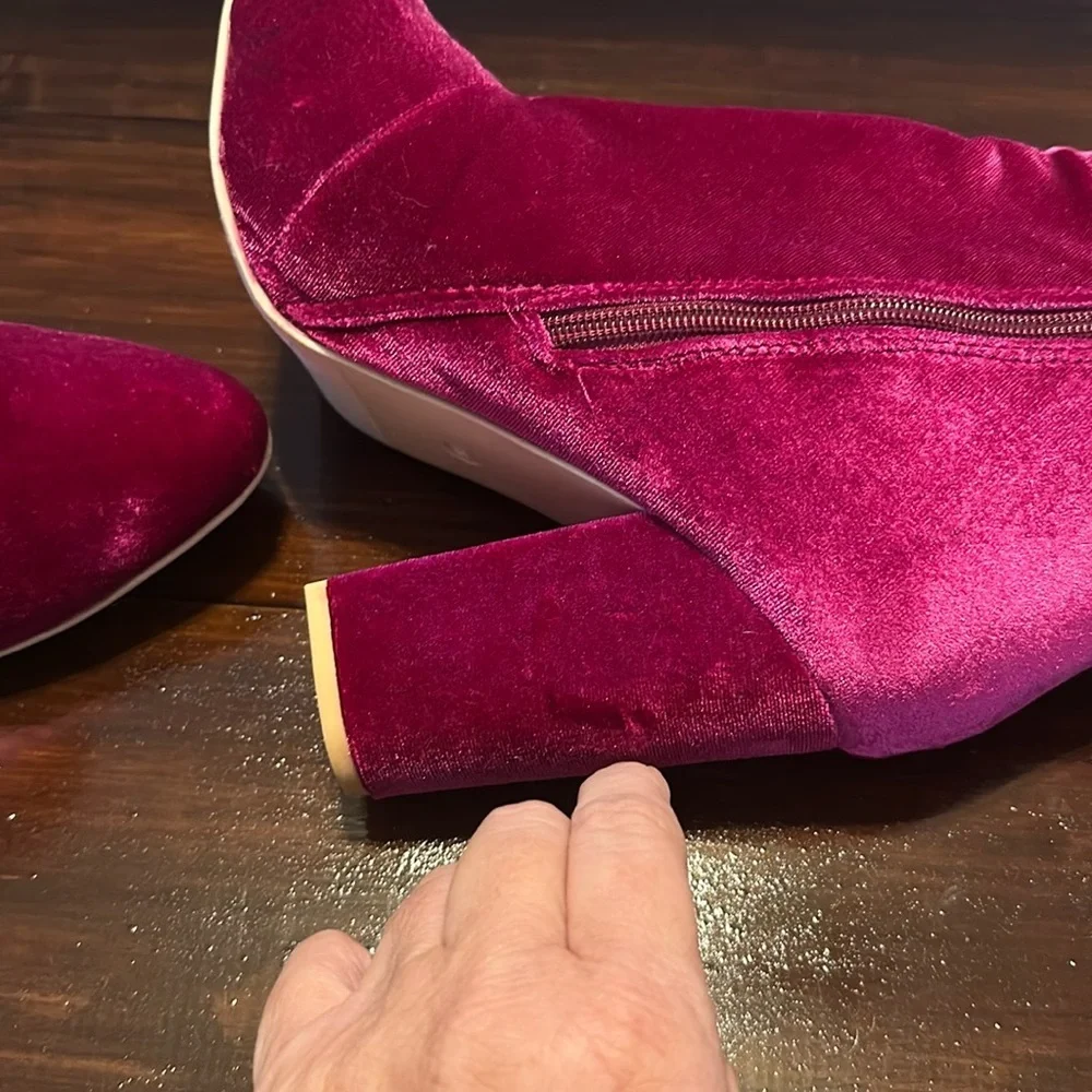 New but tried on Velvet Pink Ankle Boots. Size 9.5. Zip on side. Heel 4”.
